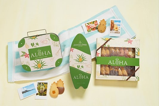 Our Aloha Collection products laying on the sand in the warmth of the sun.
